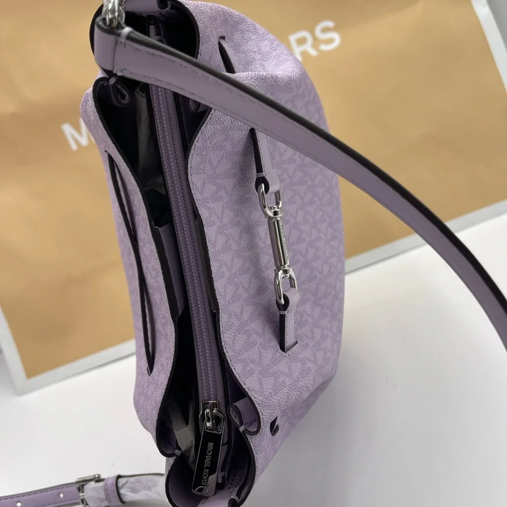 MICHAEL KORS Carson Md Logo Convertible Bucket Crossbody Shoulder
Lt Quartz
NWT - Picture 9 of 16